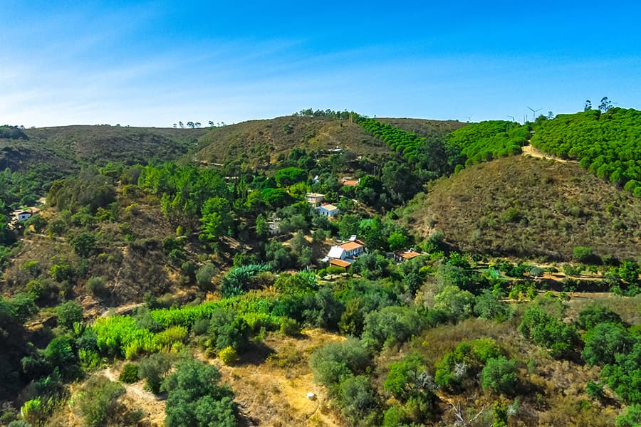 Aerial view of Moinhos Velhos nestled in its green Algarve valley