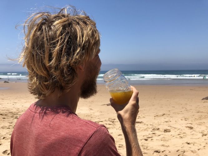 Drinking Juice at Amado Beach